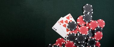 Mobile phone showing live blackjack table with dealer and cards visible on screen